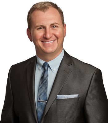 Portrait of Gregory Szewczyk, REALTOR®.